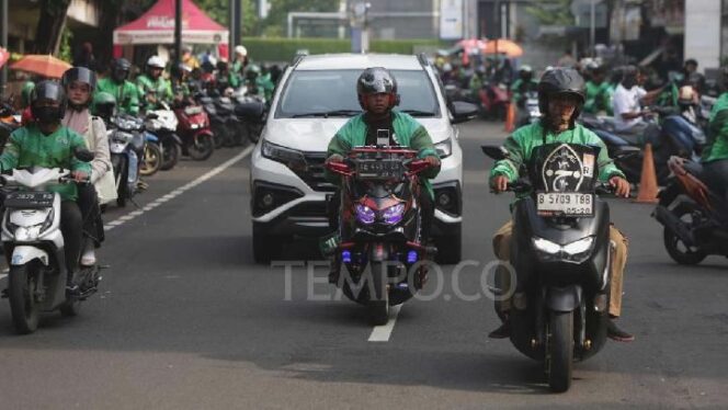 
					Asyik! Iuran BPJS Ketenagakerjaan Ojol Dipangkas, Dompet Pengemudi Auto Senang!