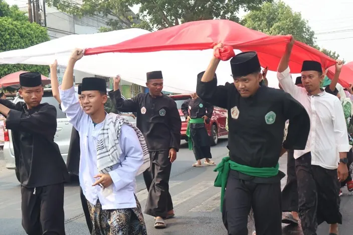 Bentangan Merah Putih, Nyala Abadi Resolusi Jihad di Bumi Tebuireng